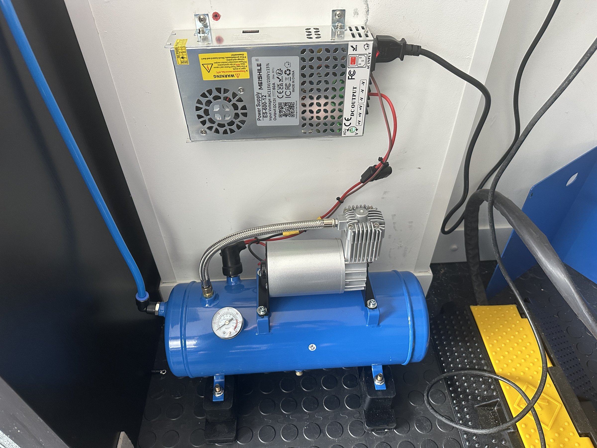 Small compressor and AC-DC PSU for lift lock release.