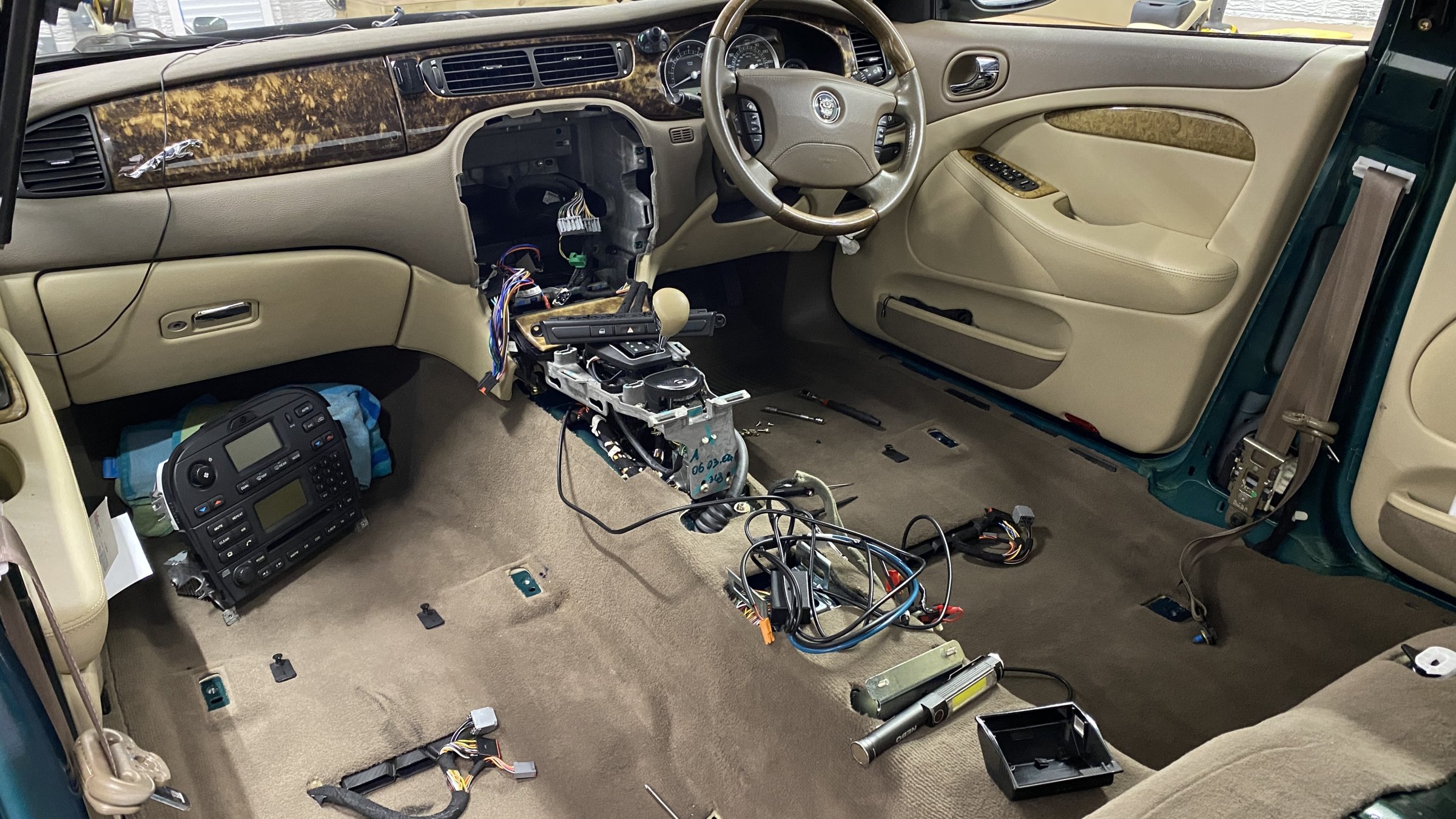 Centre console stripped out to allow wiring for headrest screens to be routed