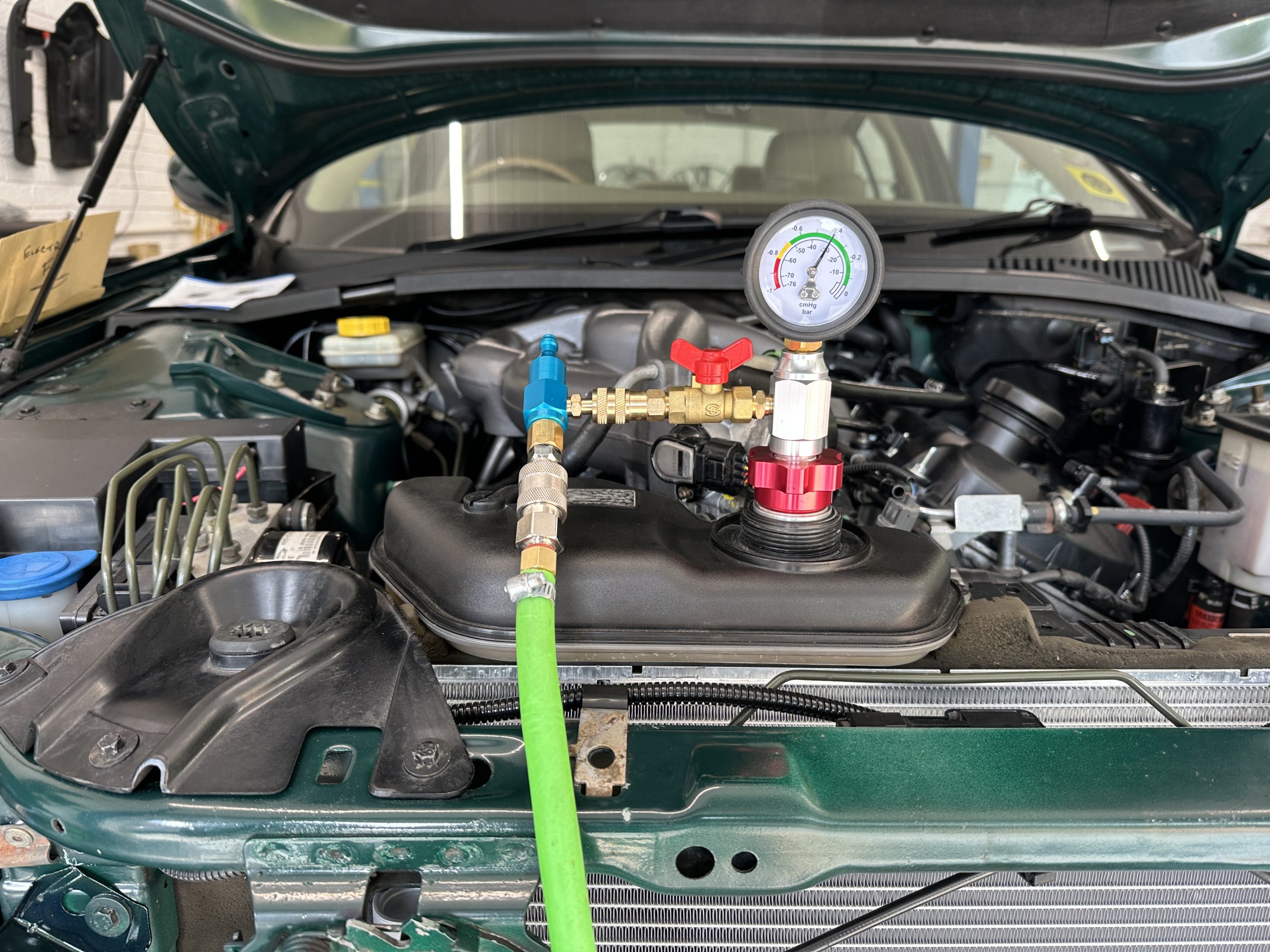System filled with Deionised water and flushing fluid. Coolant added after flush.