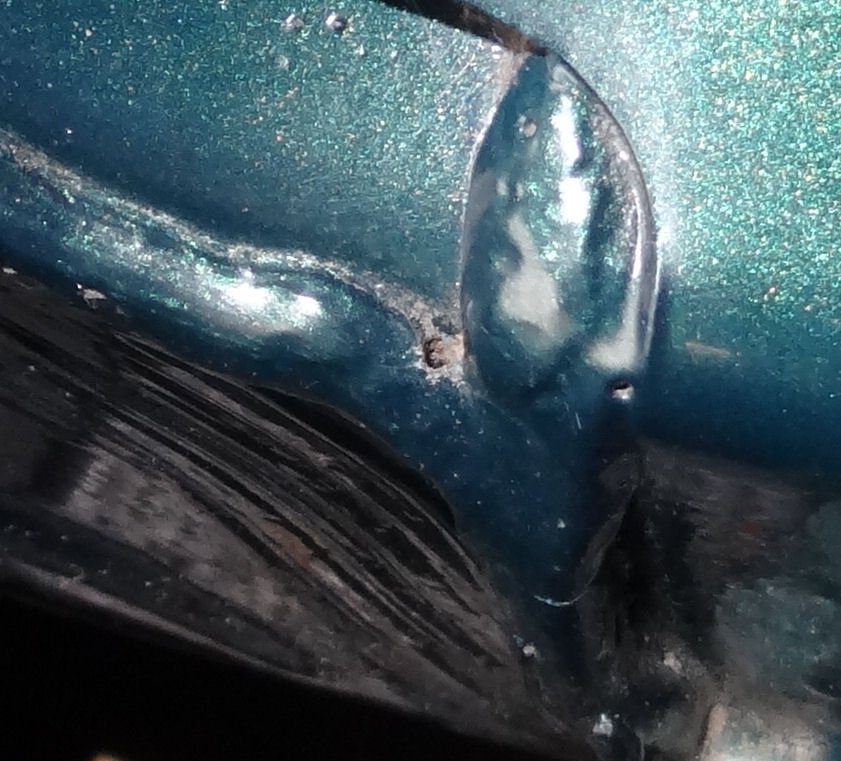 Tiny hole in lamp surround sealant was main culprit